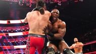 Carrillo in action against Lashley while Rusev watches on